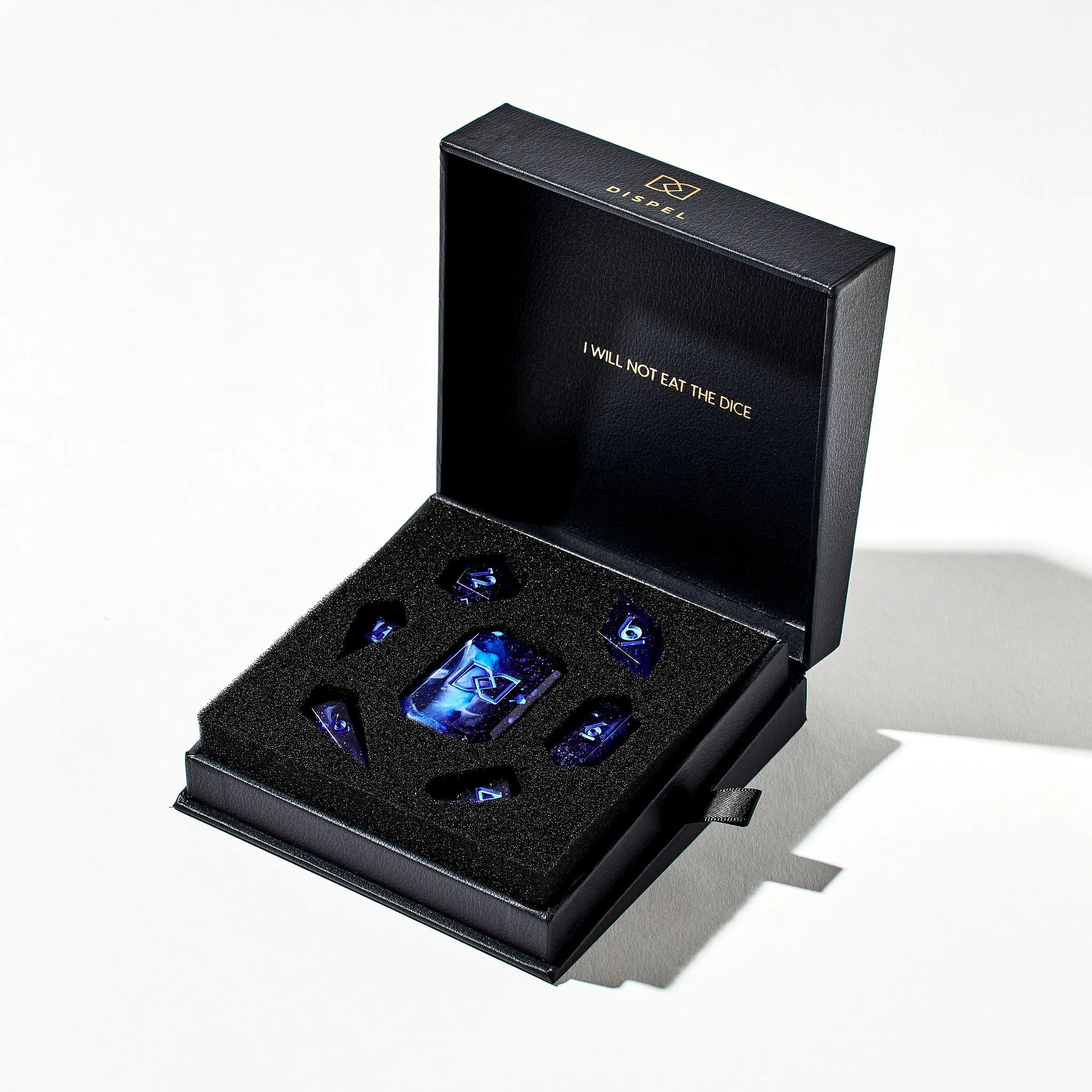 Deep and Light Blue Mixed Jewel Shaped Dice Set in the Box on a White Background