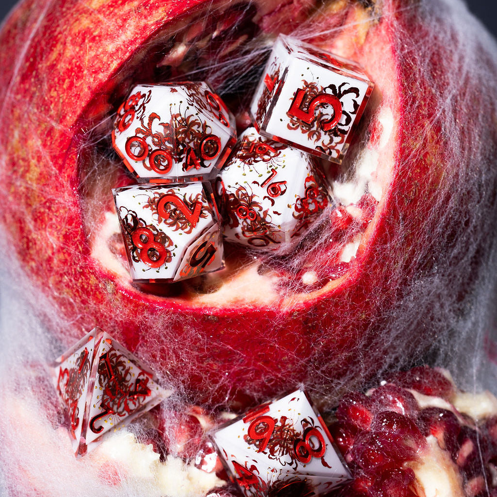 Kiss of the Spider Lily 7-Piece Iconic Dice Set | Dispel Dice®