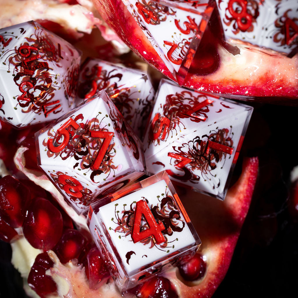 Kiss of the Spider Lily 7-Piece Iconic Dice Set | Dispel Dice®