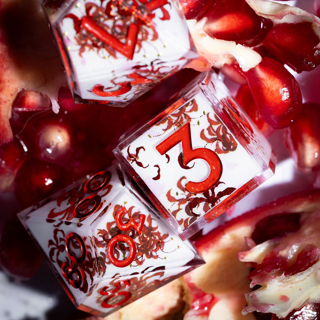 Kiss of the Spider Lily 7-Piece Iconic Dice Set | Dispel Dice®