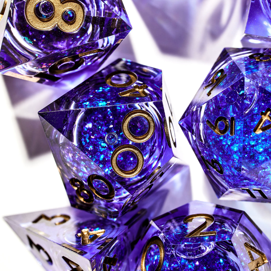 The Weave Blue Liquid Core DnD Dice Set on a white background | Dispel Dice