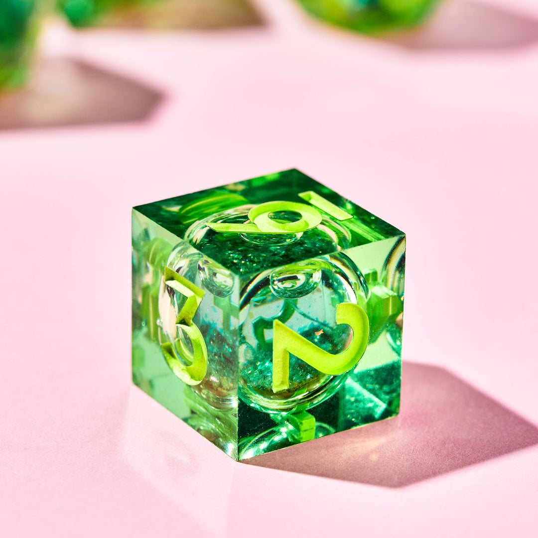 Green Gamer Juice 7-Piece Liquid Core Dice Set | Dispel Dice