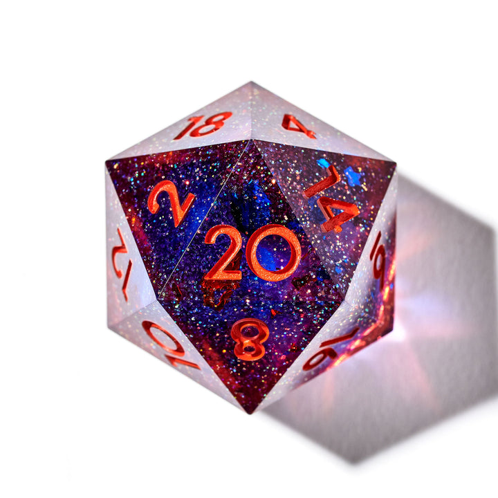 Blue and red D20 with red numbering on a white background