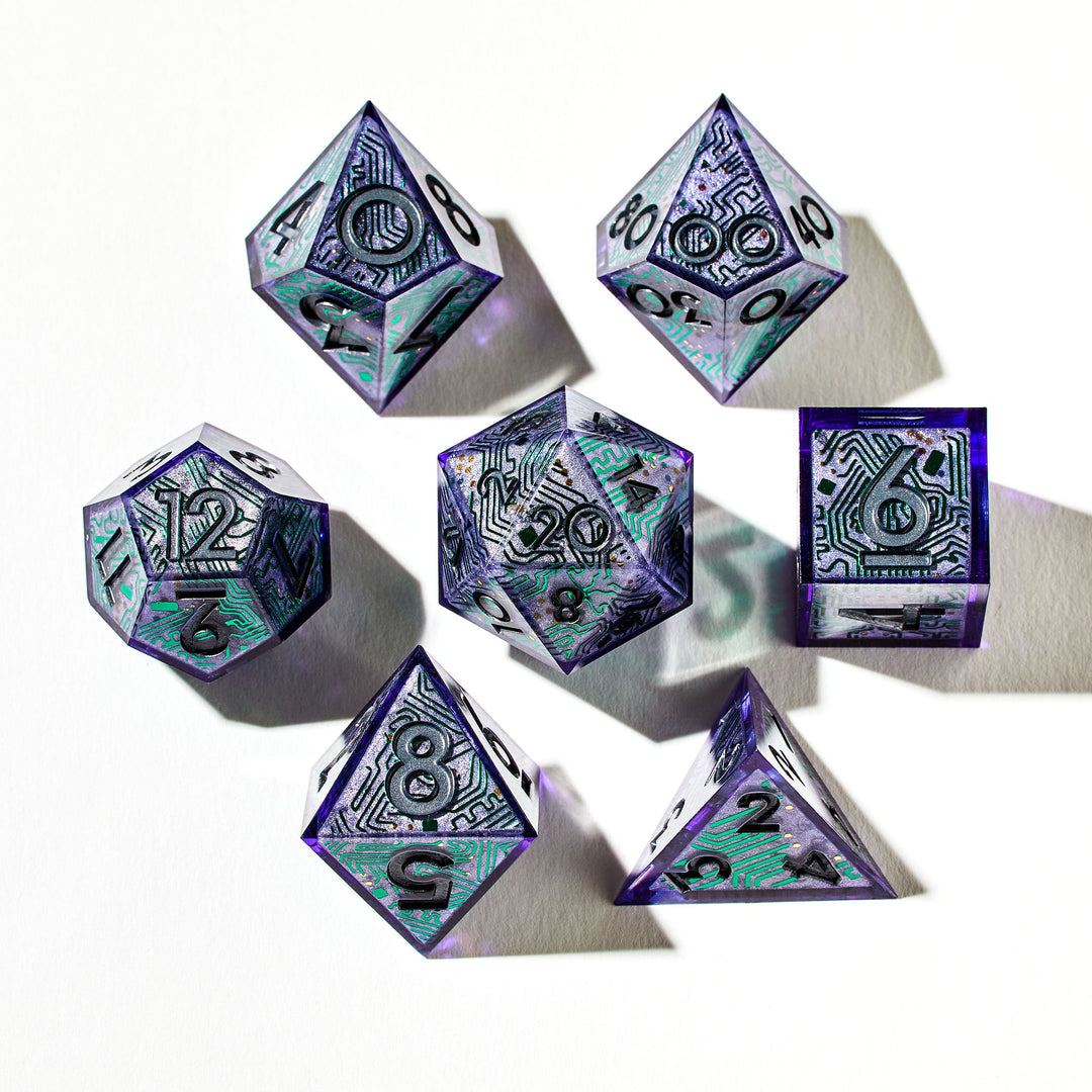 Close up of a purple dice set with circuit board like designs