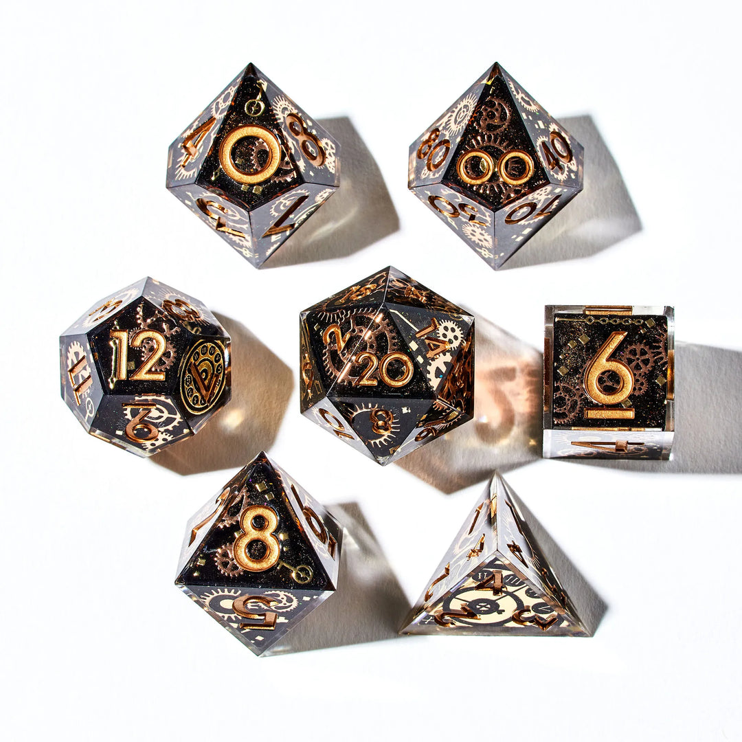 Picture of a full black DnD dice set with copper cogwheel designs and copper inked numbers