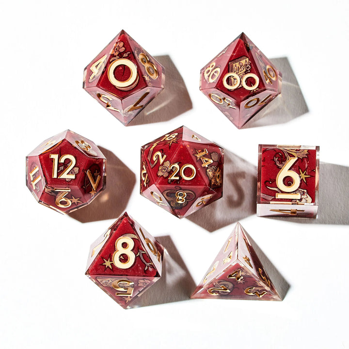 Picture of a full red DnD dice set with otherworldy decals and yellow inked numbers