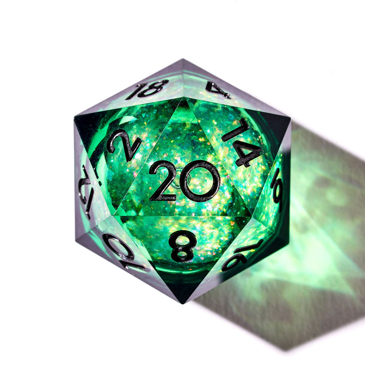 Close up of a green liquid core D20