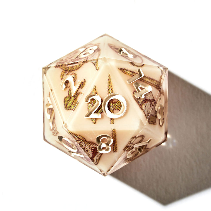 Close up of a beige D20 with sketch-like designs