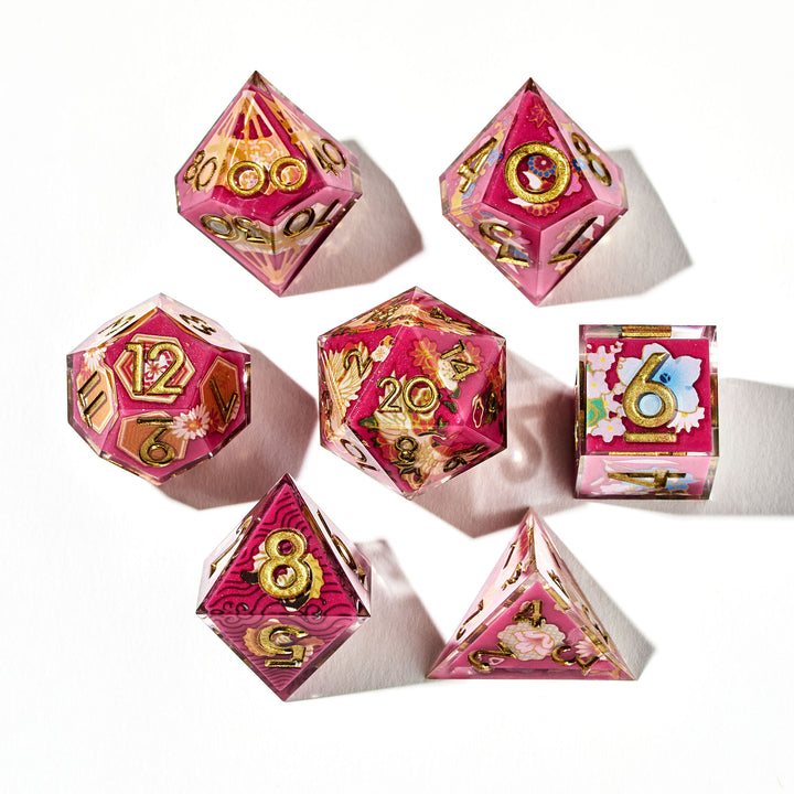 Close up of a red dice set with Japanese art designs