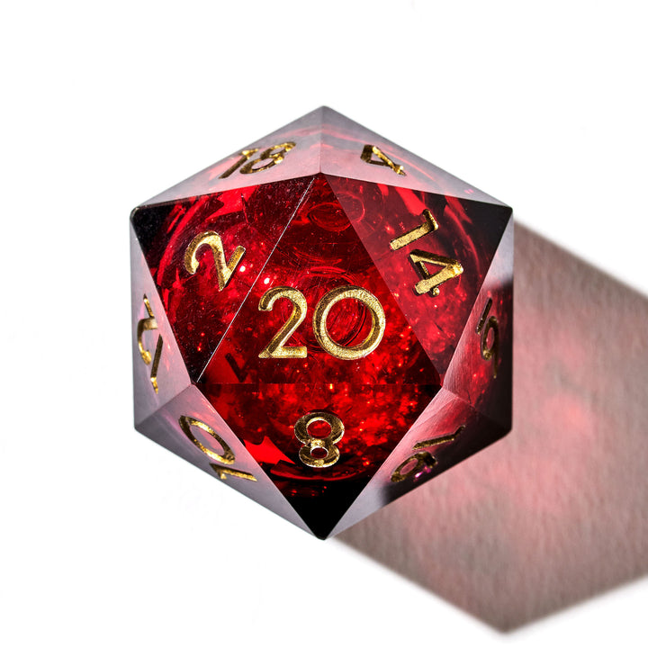 Close up of a red liquid core D20