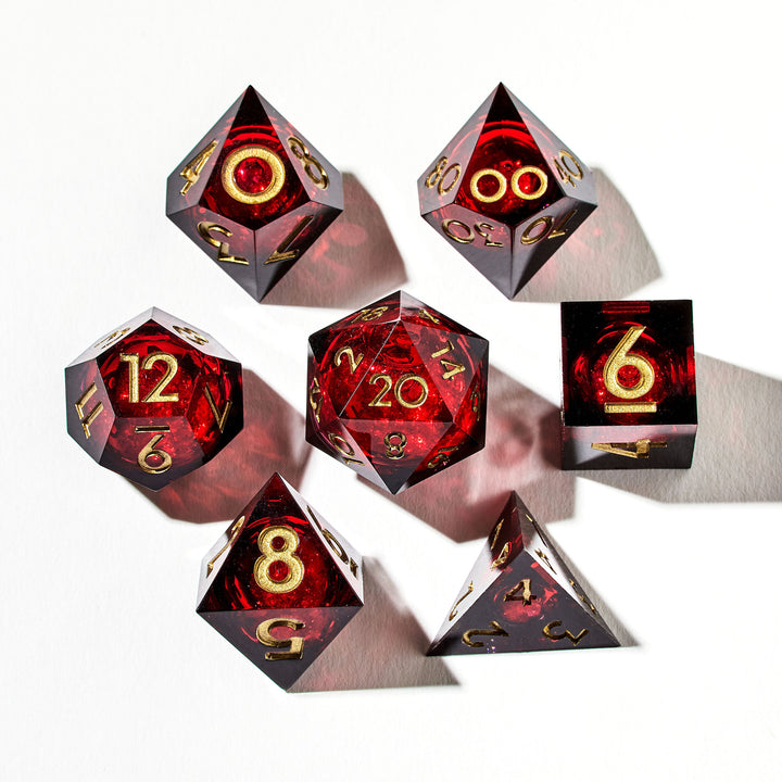 Close up of a red liquid core dice set